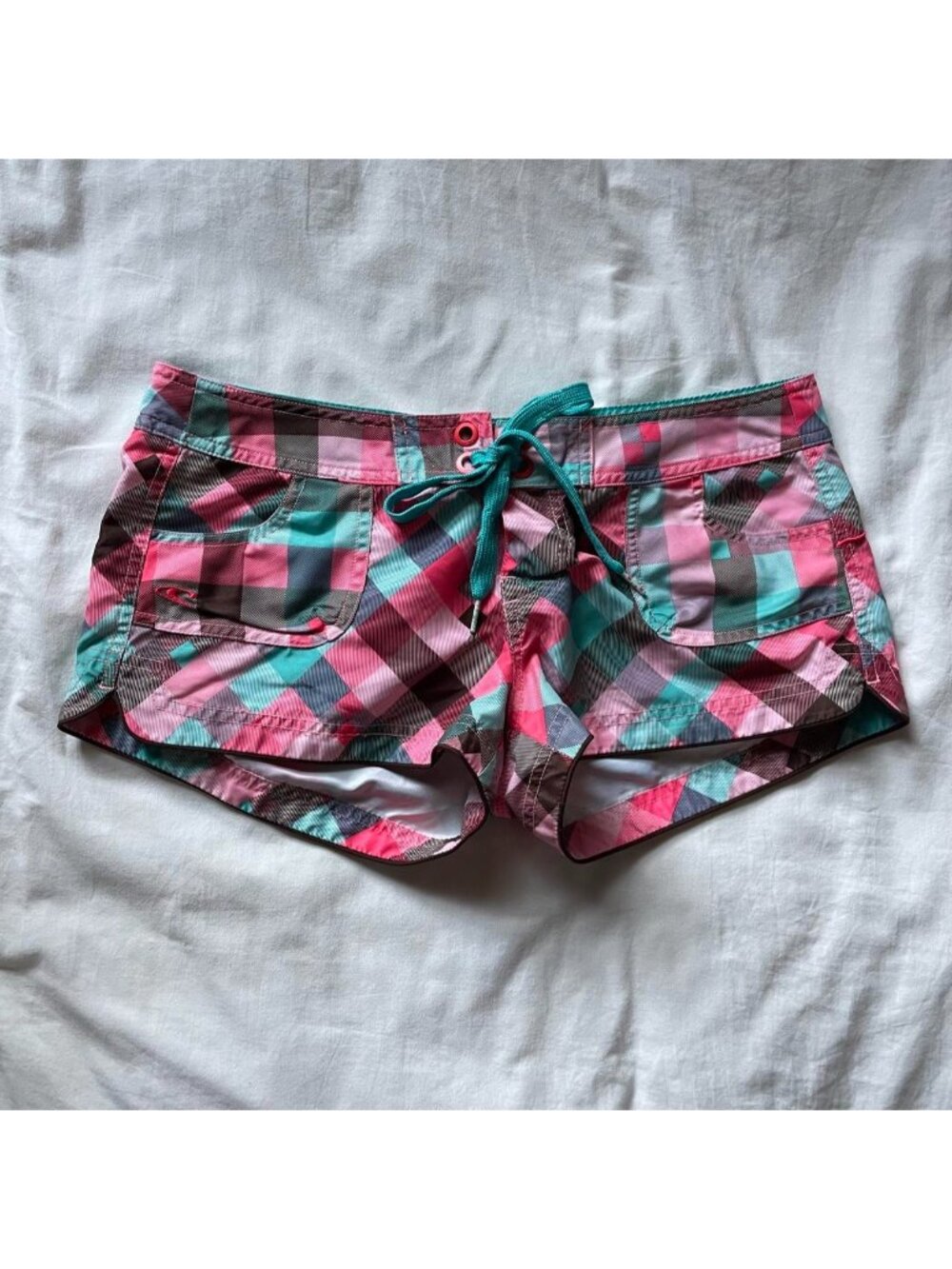 2000s O'Neill pink, teal, and brown plaid board shorts